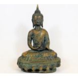 A Chinese deity, indistinct four character mark to rear, 11.5in high x 7in wide 1.3kg, small area of