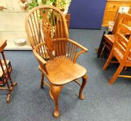 A c.1800 elm pad foot Windsor chair