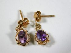 A pair of 9ct gold amethyst earrings