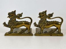 A pair of early 20thC. brass lion bookends 5in hig