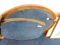 An early 20thC. wooden framed oval mirror & one ot