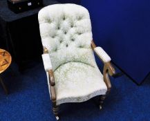 A Victorian upholstered button back chair