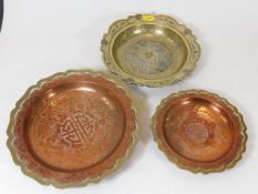 Two Chinese copper dishes twinned with Asian silve