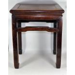 A 19thC. Chinese hardwood table, old repair to one