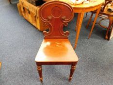 A Victorian mahogany hall chair