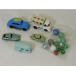 A small quantity of vintage toy cars & marbles