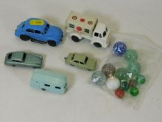 A small quantity of vintage toy cars & marbles