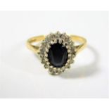 An 18ct gold ring set with sapphire & diamond 3.2g