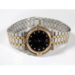 A ladies Gucci 9000L wrist watch with two colour s