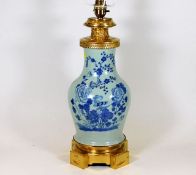 A Chinese vase later converted to lamp base fitted