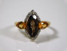 A 9ct gold smokey quartz, citrine & diamond ring 2