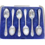 A small set of six silver teaspoons