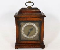 A small Elliott clock in wooden case