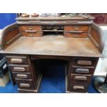 A c.1910 oak roll top desk, some faults. Provenanc