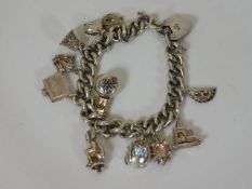A good quality silver charm bracelet 68.8g
