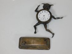 An unusual hallmarked silver Cornish pixie clock a