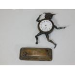 An unusual hallmarked silver Cornish pixie clock a