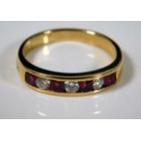 An 18ct gold ruby & diamond ring 4.4g size Q