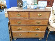 A c.1900 chest of drawers with brass fittings