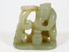 A Chinese carved hardstone figure with carp 2.375i