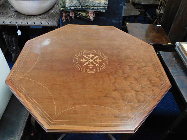 An Edwardian inlaid occasional table