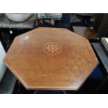 An Edwardian inlaid occasional table