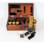 A cased Carl Zeiss brass microscope serial no. 810