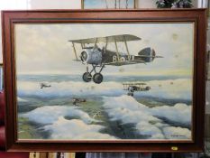 A framed oil on canvas of British military bi-plan