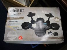 A boxed E-Drum set