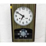 A retro Seiko 30 day wall clock