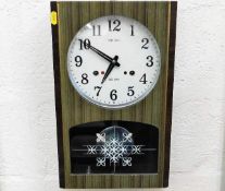 A retro Seiko 30 day wall clock