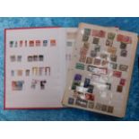Two world stamp albums & one other partial album