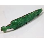 An antique Chinese carved jade hair piece