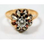 An antique yellow metal ring set with a superb diamond, loss to one white metal mount 6g size N - th