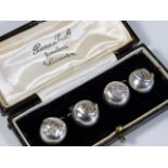 A boxed set of silver button military cufflinks