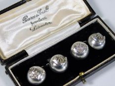 A boxed set of silver button military cufflinks