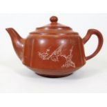 A Chinese Yixing pottery teapot with inscribed dec