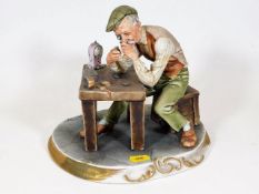 A Capodimonte bisque figure of a 'Watchmaker' sign
