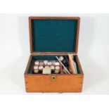 An antique boxed blood taking set