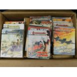 A boxed quantity of Commando booklets