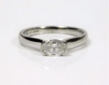 A platinum diamond solitaire ring set with oval stone of approx. 0.7ct 4.9g size L/M