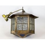 A brass arts & crafts porch lantern