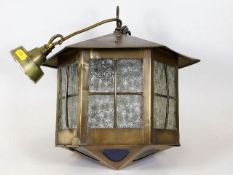 A brass arts & crafts porch lantern