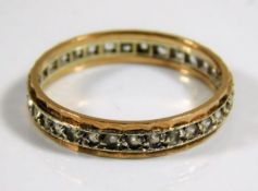 A 9ct gold eternity ring set with white stones 2.2