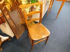 An early 20thC. childs elm school chair