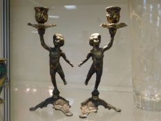 A pair of late 19thC. cast gilt bronze candle hold