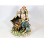 A large Capodimonte figure group of pirate with tr