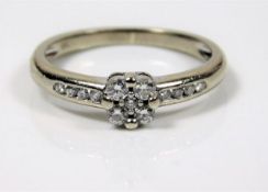 A 9ct white gold diamond ring 2g size L