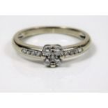 A 9ct white gold diamond ring 2g size L