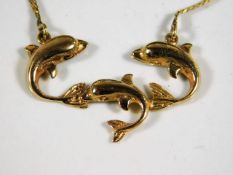 A 14ct gold dolphin pendant with necklace with box